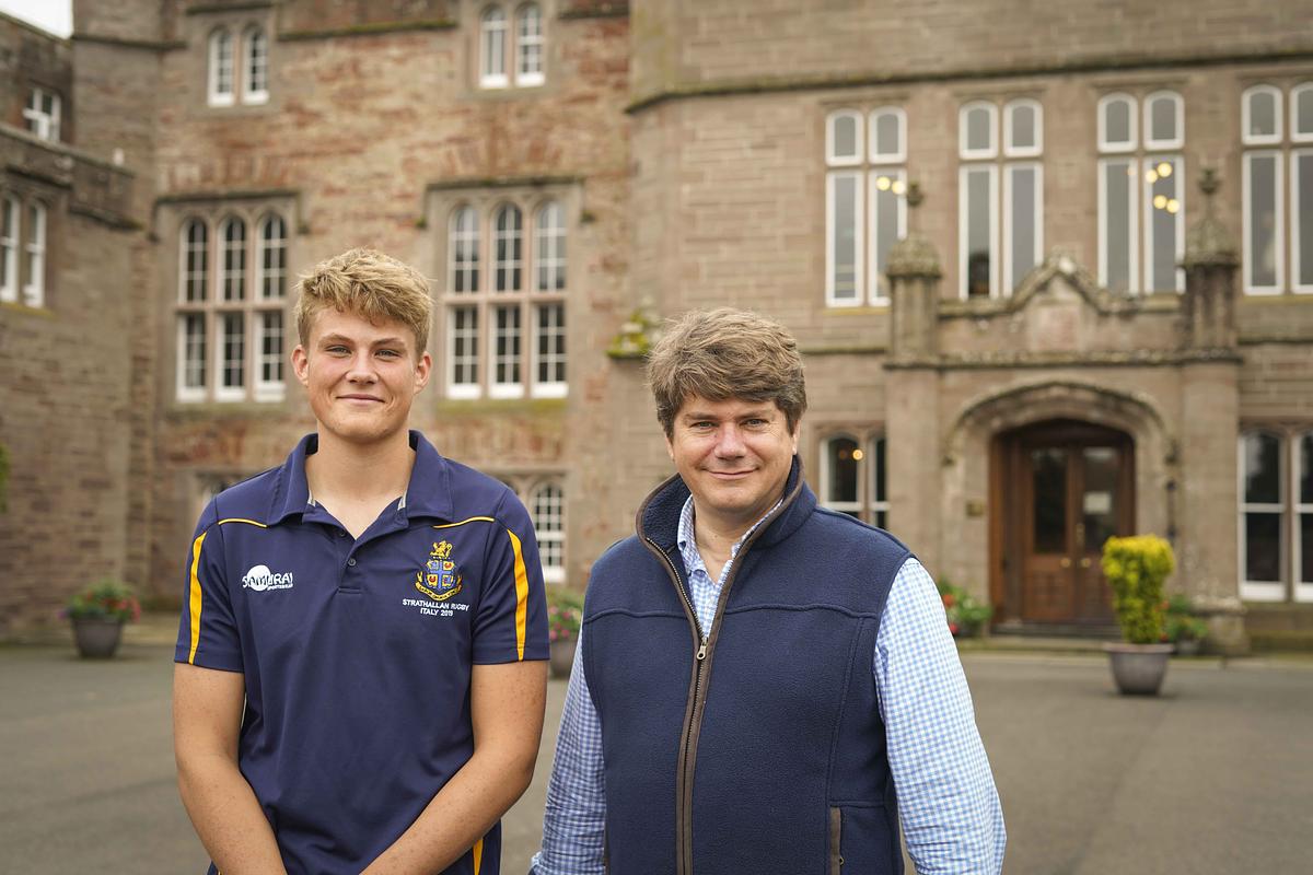 Father and son celebrate outstanding A-Levels